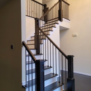 Removed old railing and installed new custom railings, with an additional new dark stain finish in Manalapan NJ