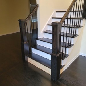 Removed old railing and installed new custom railings, with an additional new dark stain finish in Manalapan NJ