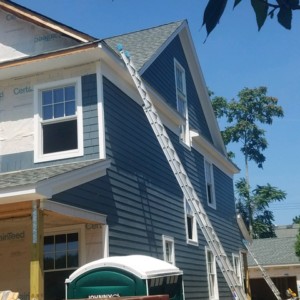 New roof, porch, windows and siding installation, in Spring Lake NJ.