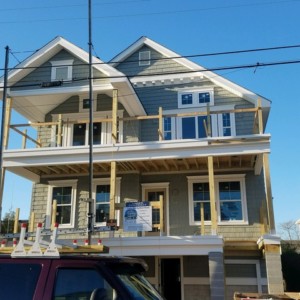 New roof, porch, windows and siding installation, in Spring Lake NJ.